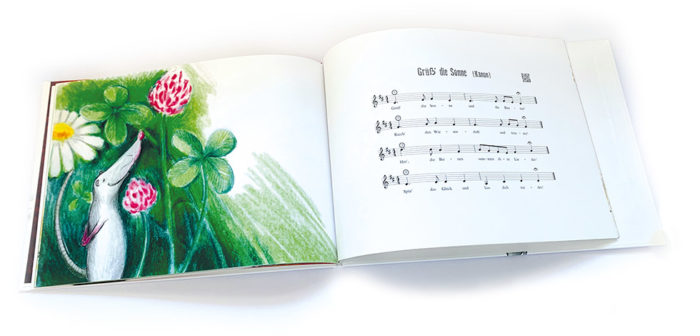 Innenansicht Buchseite mit Liedtext und Noten